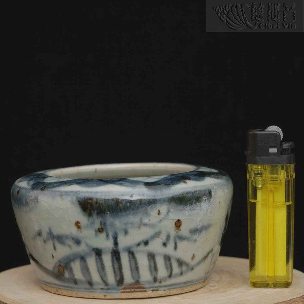 Vessel with floral in underglaze blue