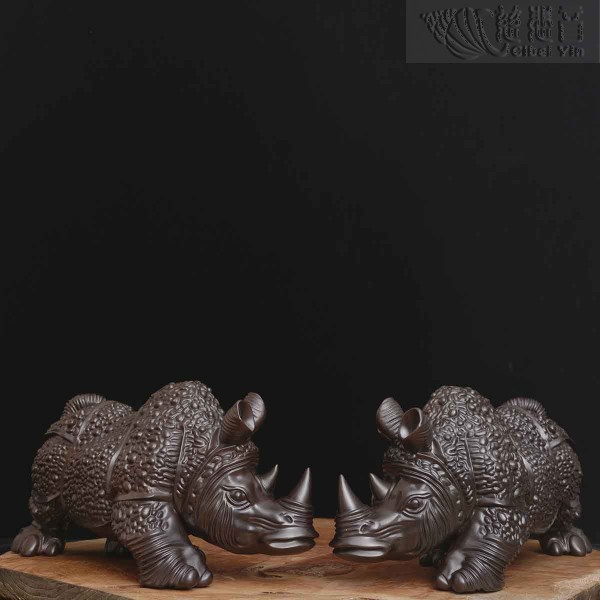 A pair of copper armor rhinoceros ornament--- bronze