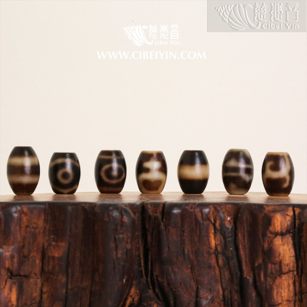 Dzi Bead (Brown/Black) – 16 mm – Random Shipment