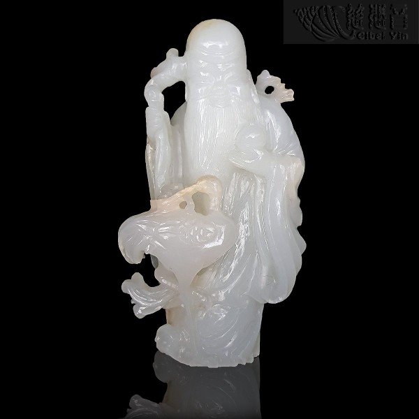 A White Jade Figure of Shoulao