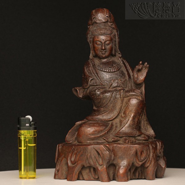 Old bamboo carved relaxing Guanyin statue