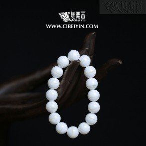 Golden Silk Tridacna Bracelet - 12mm