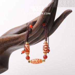 Auspicious Protective Dzi Bead Bracelet (Double Tiger Tooth, Wealth God, Single-Eyed Mountain Support) – 19 mm