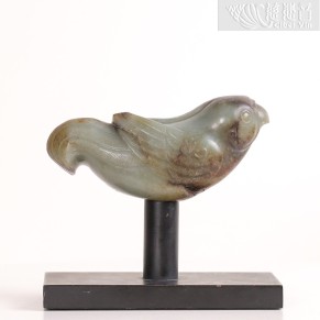 Qing Dynasty, Green Jade Staff Finial in the Form of a Dove